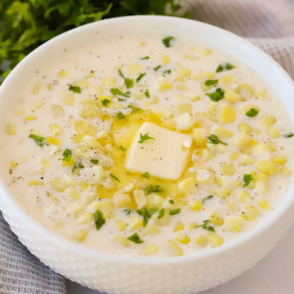 homemade cream of corn in a large white bowl
