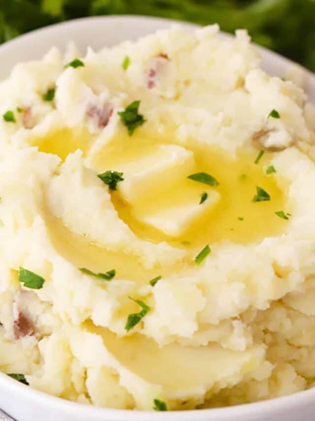 mashed red potatoes in a large white bowl, ready to be served, ed potato mashed potatoes.