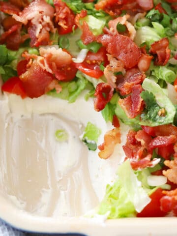 blt dip with bacon on top, an easy bacon appetizer