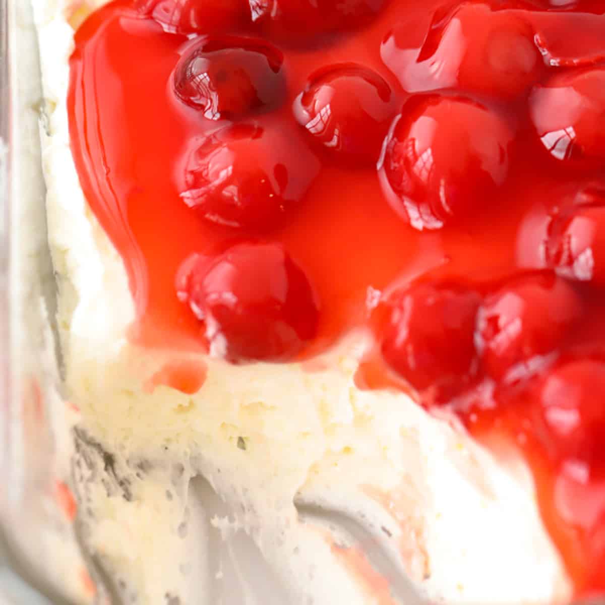 no bake cheesecake dip with cherries on top, cherry delight dessert.