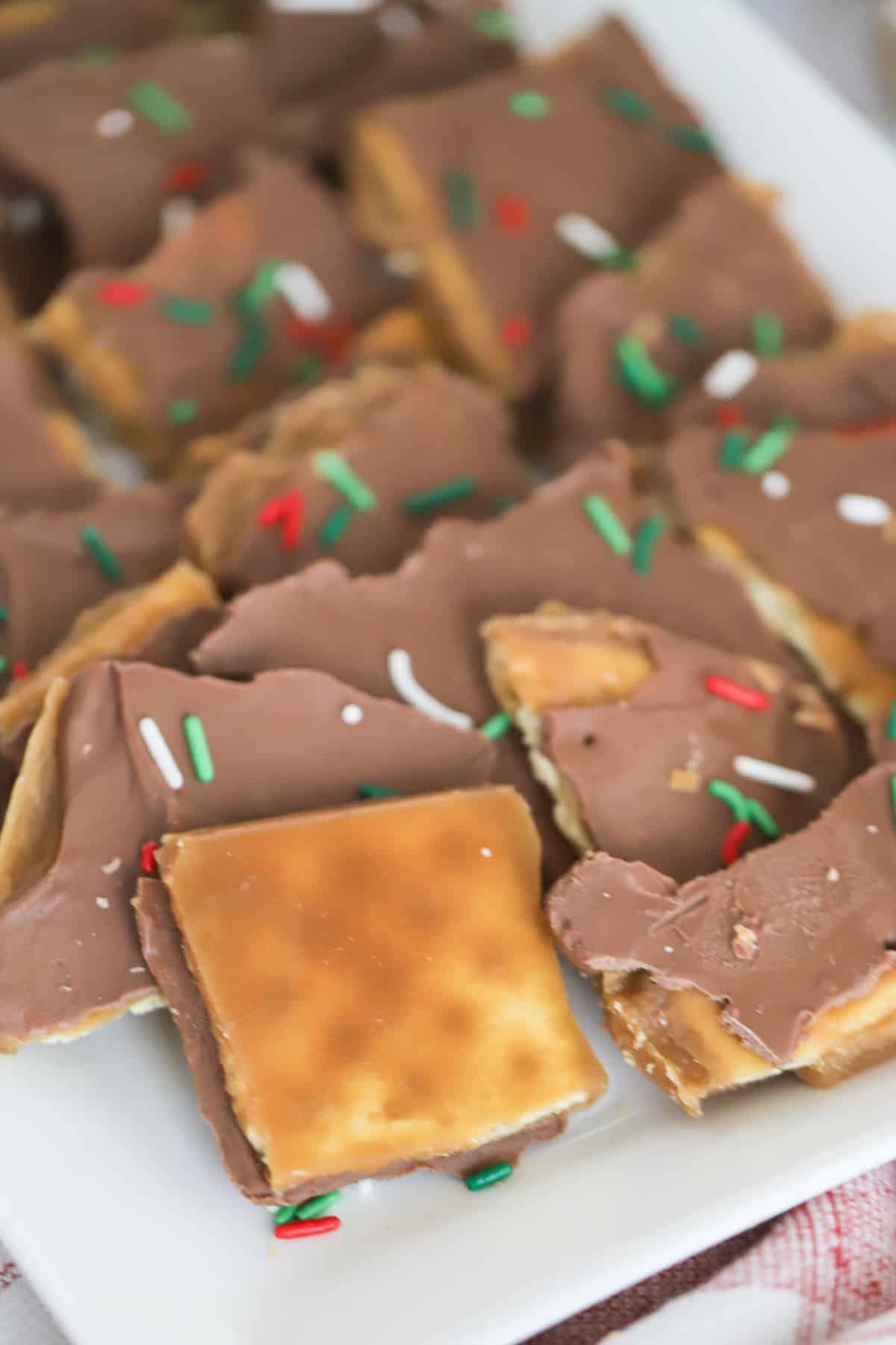 saltine cracker toffee on a white plate