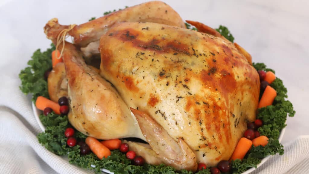 roasted turkey recipe with herb butter, thanksgiving turkey recipe, herb roasted turkey, best herbs for turkey.