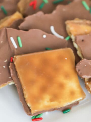 saltine cracker toffee on a white plate
