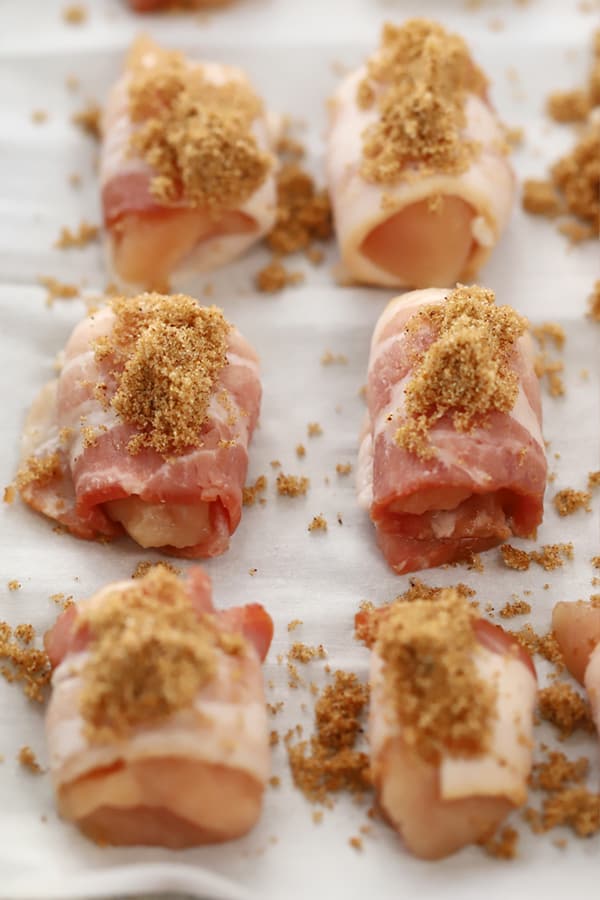 bacon wrapped chicken with brown sugar on top
