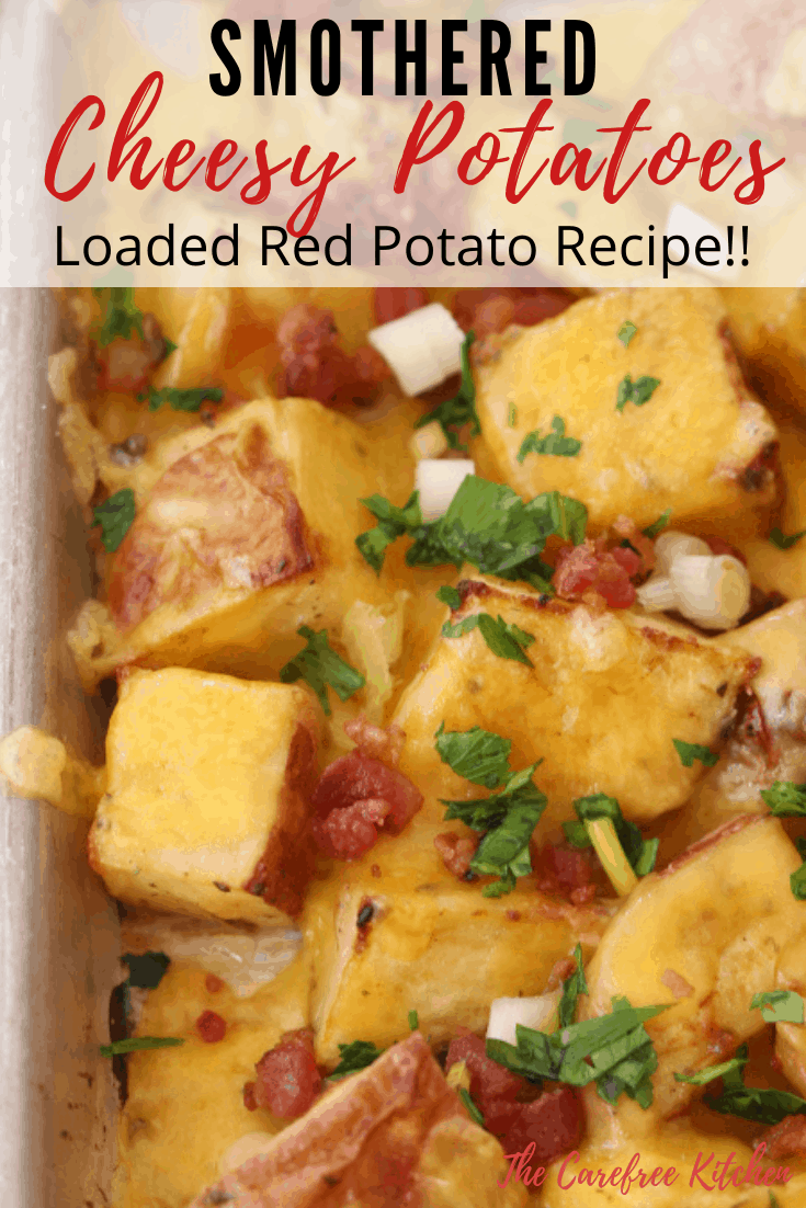 herb and garlic roasted potatoes with cheese on top, also topped with bacon and green onions.