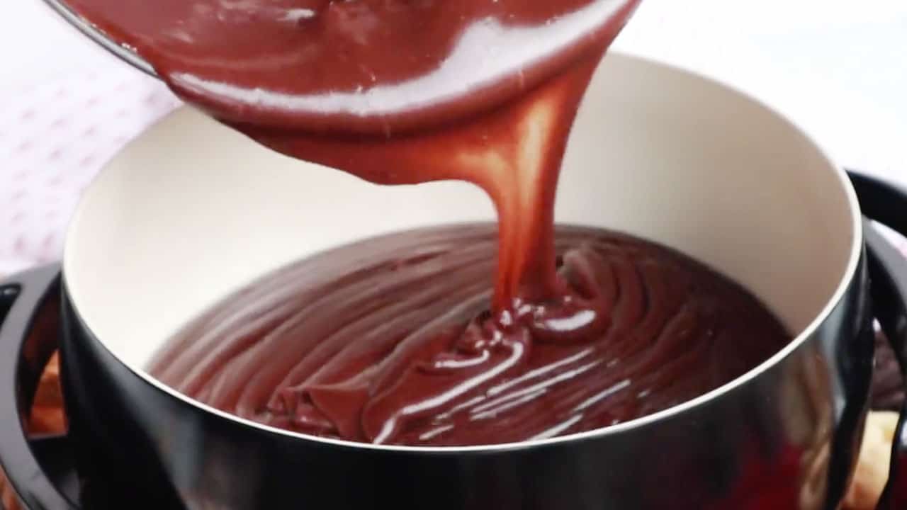 pouring chocolate into fondue pot