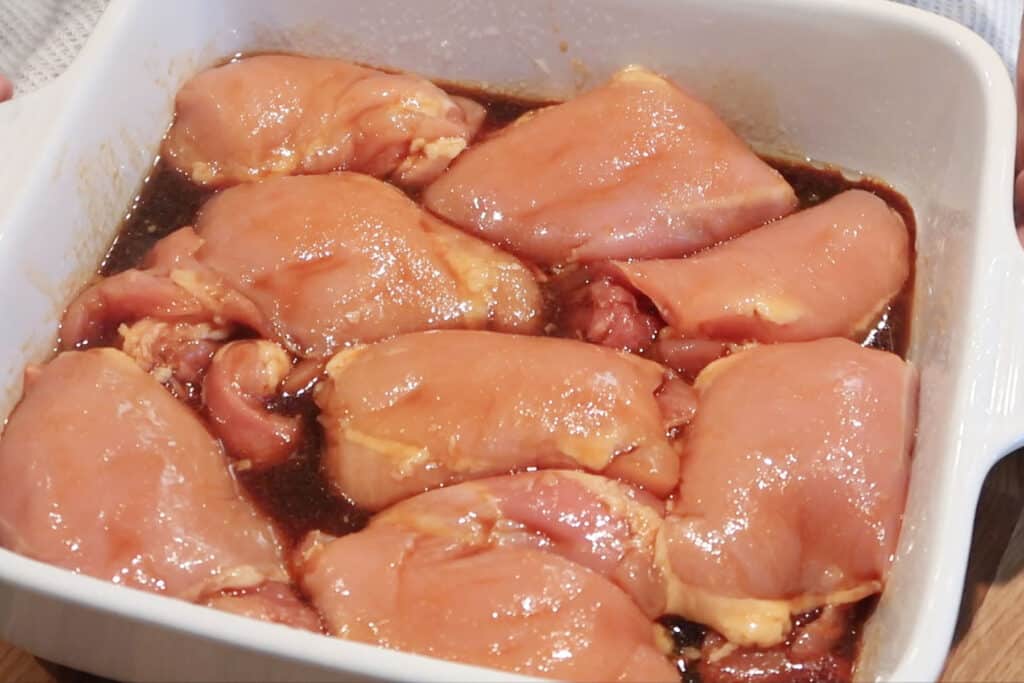 Honey Soy Chicken Thighs in a baking dish before baking, soy honey chicken thighs.