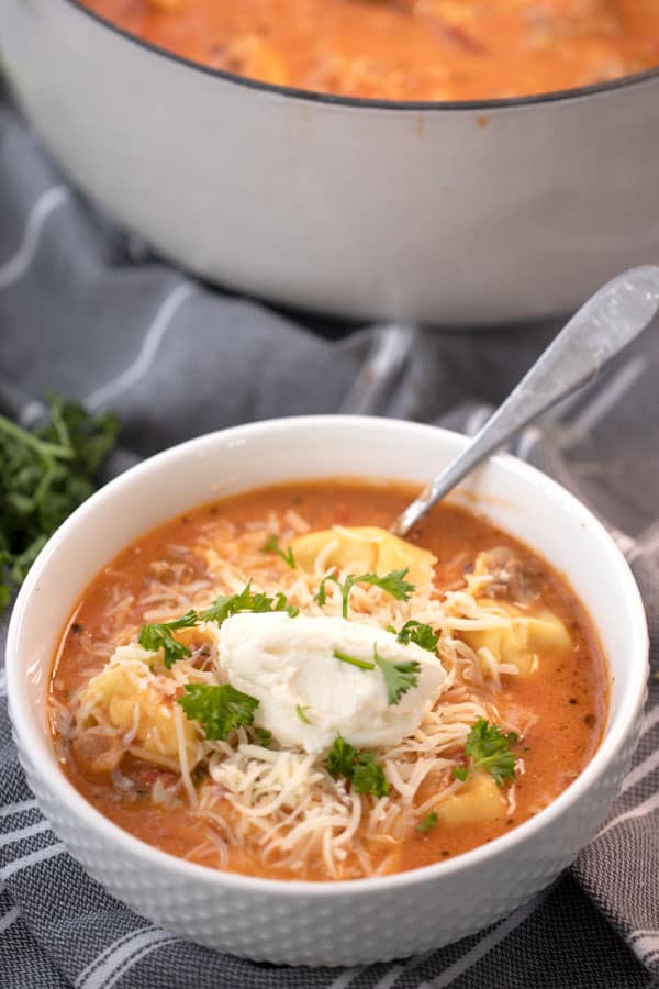 easy lasagna soup recipe served with ricotta cheese and mozzarella cheese on top, lasagna soup recipe easy, lasagna soup easy, recipe lasagna soup, recipe for lasagna soup.