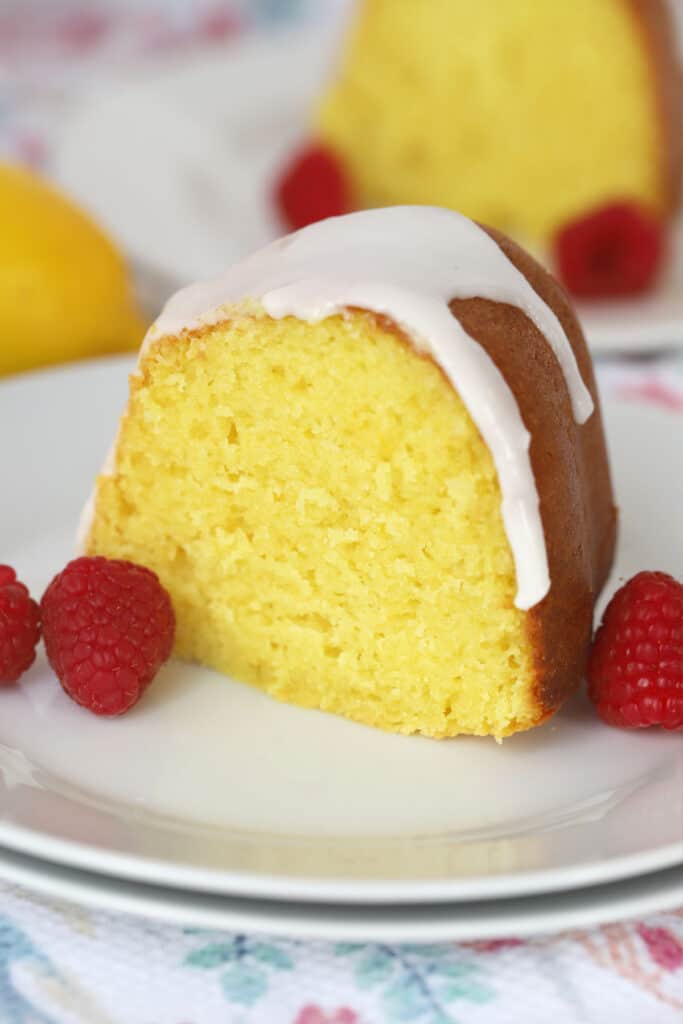 lemon cake recipe bundt with lemon glaze on a white plate