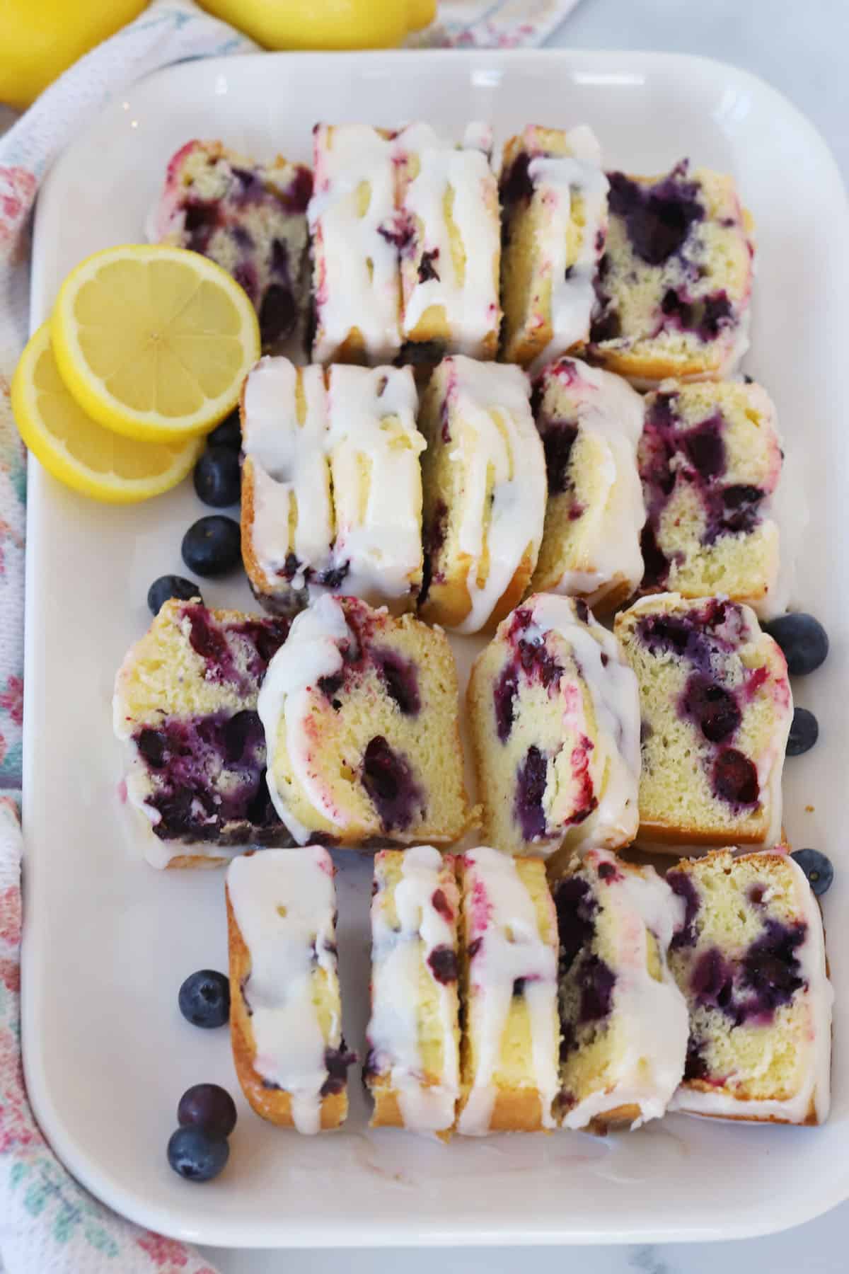 lemon blueberry mini loaves on a white platter