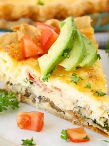 quiche recipe with avocado and tomatoes on top