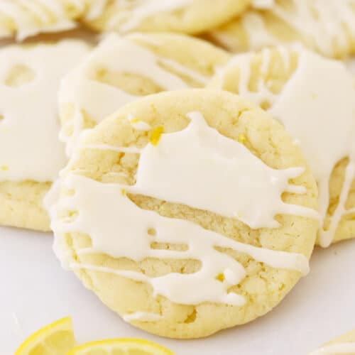 glazed lemon cookies on parchment paper