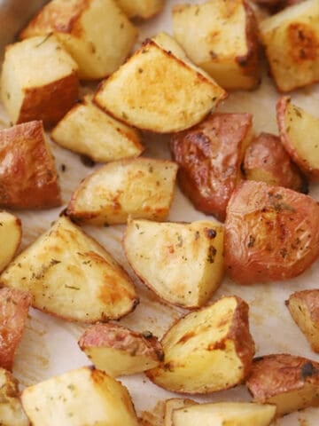 ranch potatoes on a baking sheet, recipe for ranch potatoes. ranch potatoes recipe.