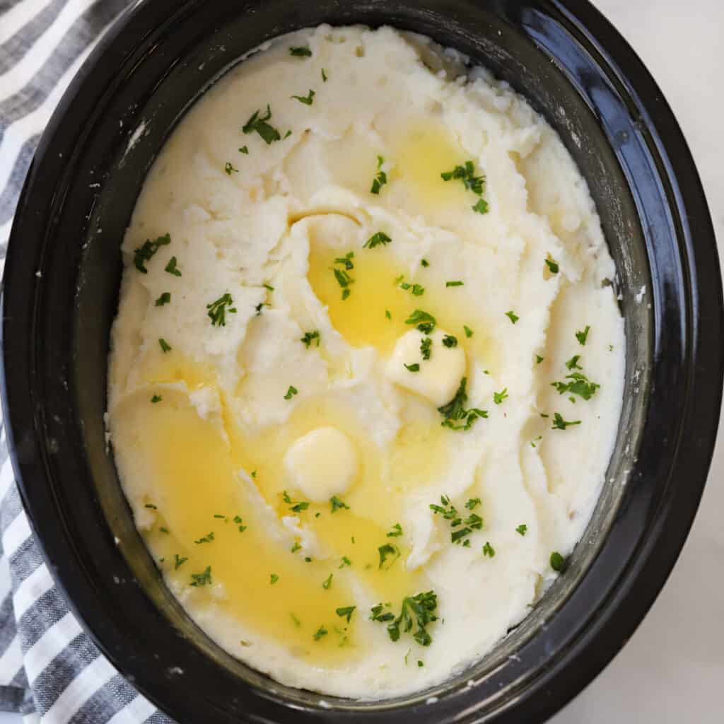 Crockpot mashed potatoes in a crockpot, mashed potatoes in crock pot.