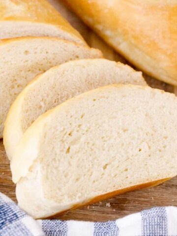 Homemade French Bread recipe on a cutting board, how to make french bread.