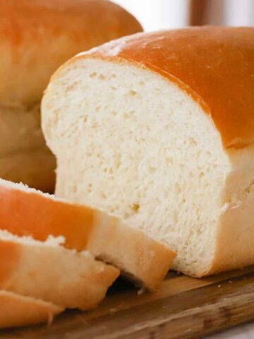 best white bread recipe on a cutting board, easy homemade bread recipe, soft bread recipe.