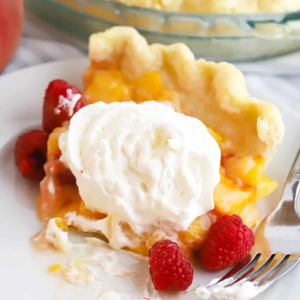 fresh peach and raspberry pie is a perfect memorial day dessert recipe.