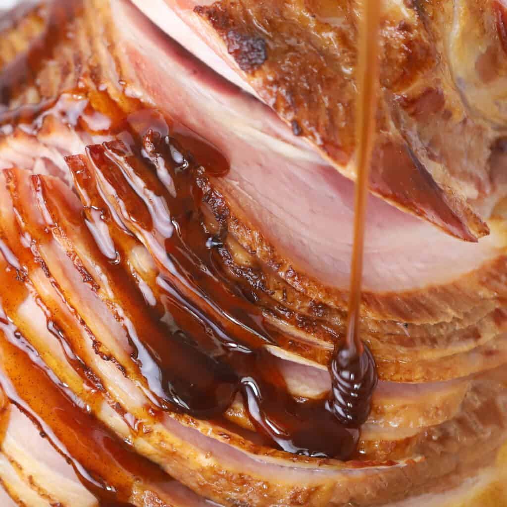 how to cook a spiral ham, spiral sliced ham drizzled with honey glaze, easter ham. Easter dinner ideas. Menu ideas for dinner. What is a traditional easter dinner menu?