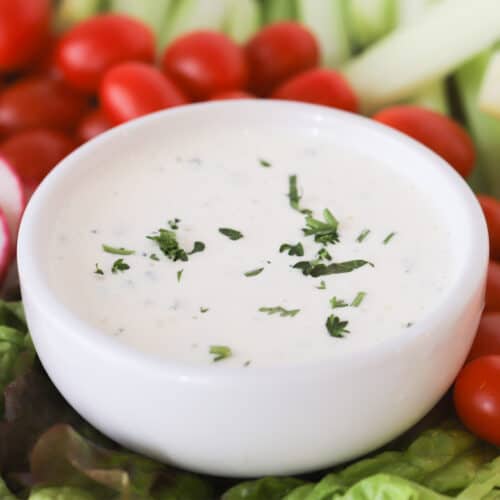homemade ranch dressing recipe in a white bowl, how to make ranch at home.