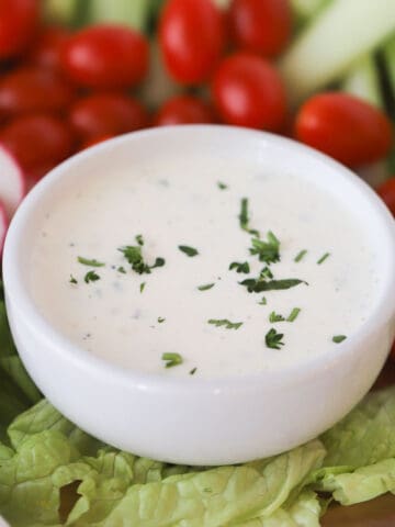 homemade ranch dressing recipe in a white bowl, how to make ranch at home.