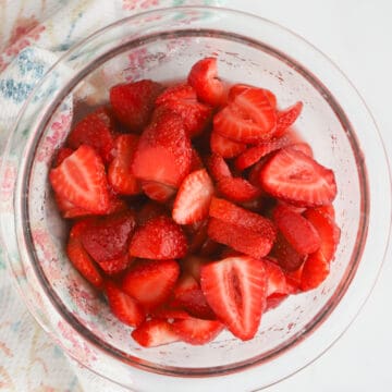 macerated strawberries in a small glass dish