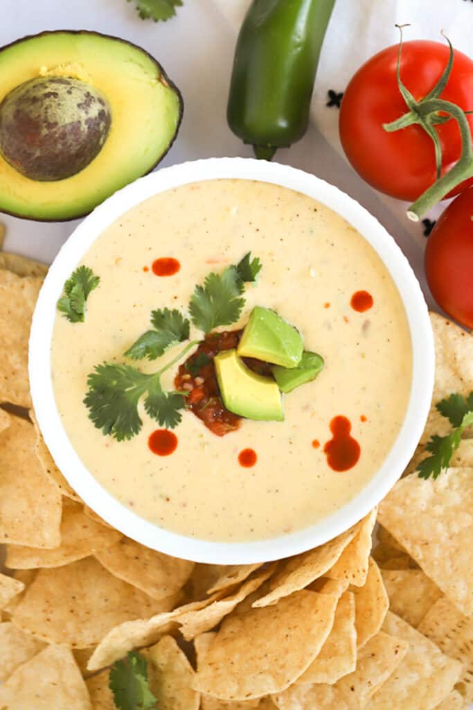 white queso dip, served with chips