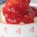 strawberry sauce on ice cream