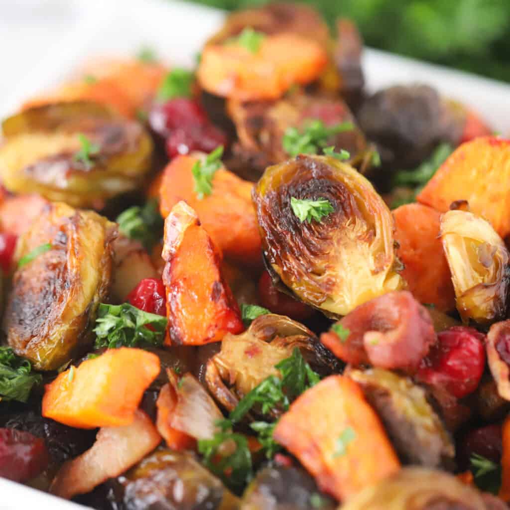 roasted Brussel sprouts and sweet potatoes with cranberries. thanksgiving vegetable recipes.