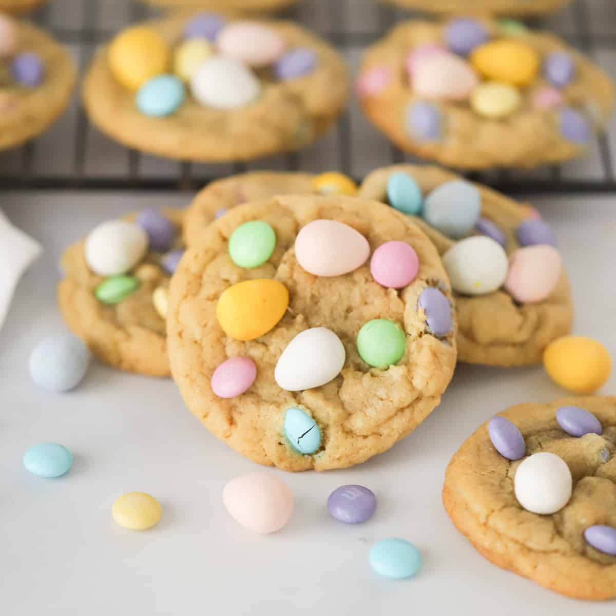 easy cadbury cookies with m and m's and cadbury eggs, mini egg easter eggs cookies, easter egg cookies.