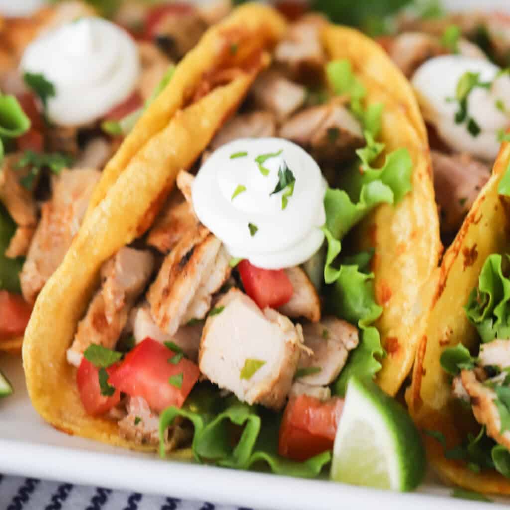 how to make the best chicken tacos with chicken thigh tacos. easy and cheap dinner ideas.