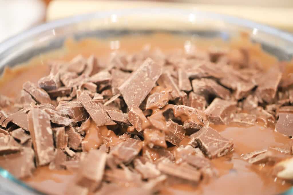 Chocolate melting in a glass bowl.