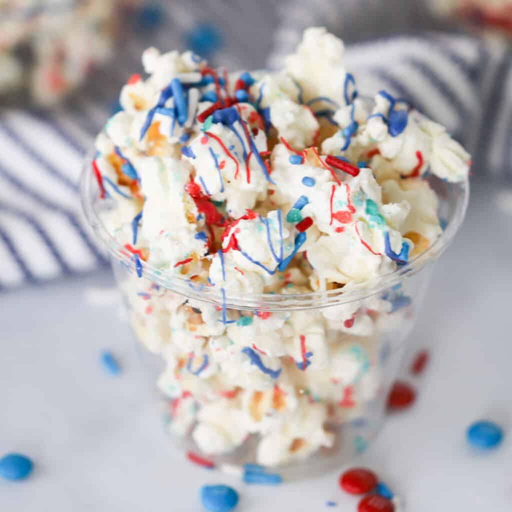 white chocolate covered popcorn, firecracker popcorn.