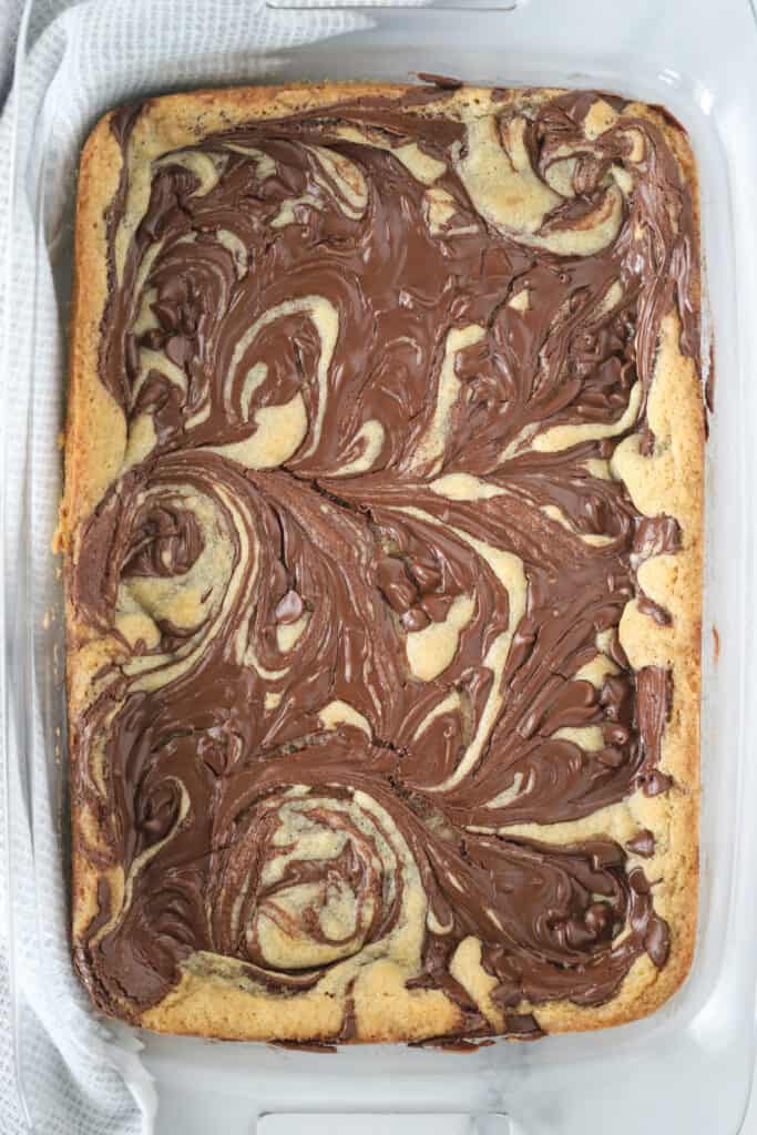 A baking dish full of uncut Chocolate Swirl Cookie Bars.