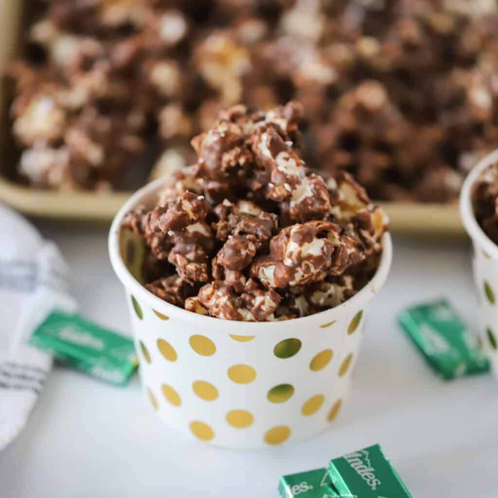 how to make mint chocolate coated popcorn using andes mints.