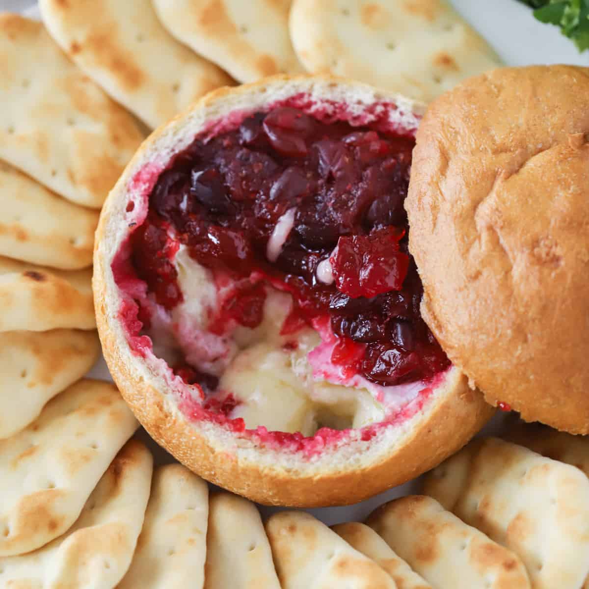 baked brie with cranberries, cranberry brie dip, brie recipes.