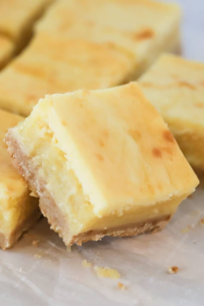creamy cheesecake lemon bar recipe, creamy lemon squares. Lemon bars with graham cracker crust.