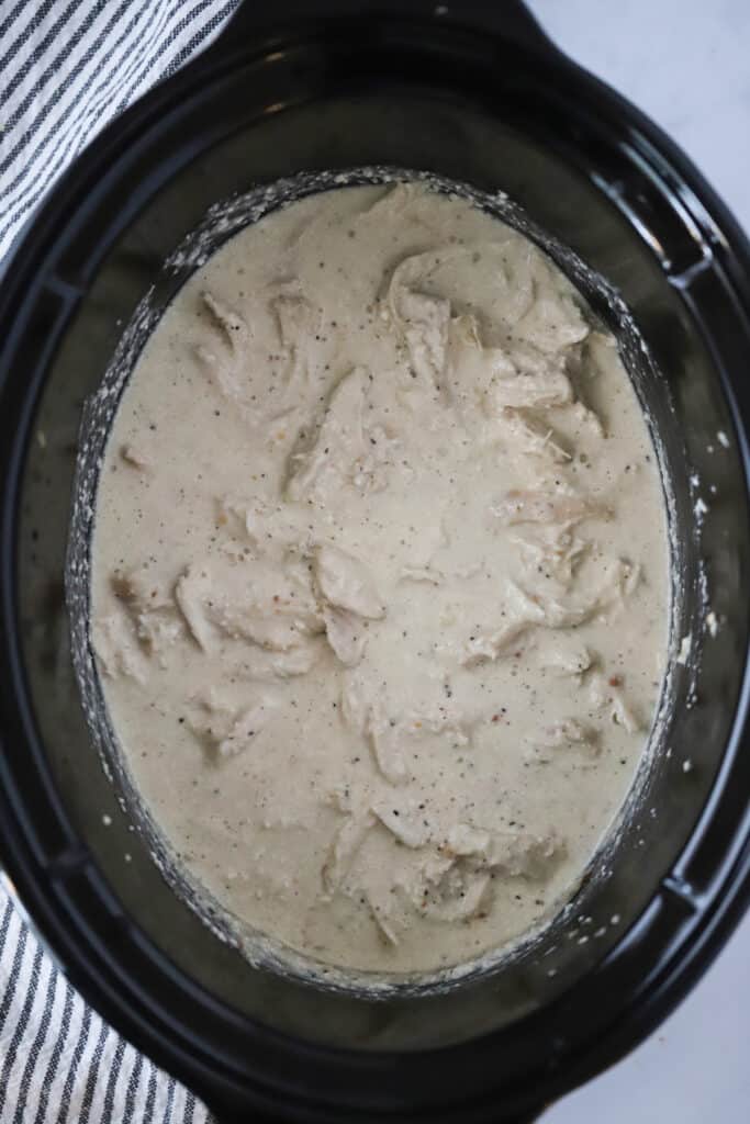 Slow Cooker Chicken and Gravy inside a slow cooker. chicken rice gravy, slow cooker chicken gravy. 
