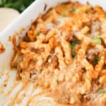 pasta bake with ground beef, baked pasta ground beef, cheesy beef pasts in a baking dish.