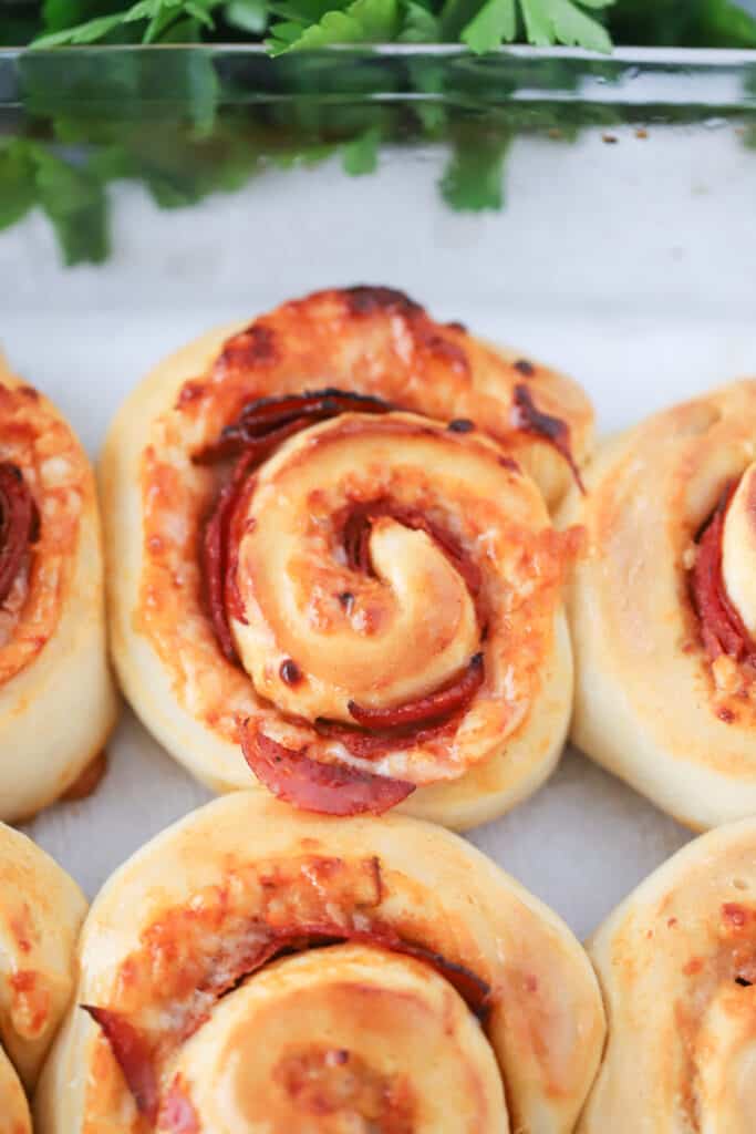 Pepperoni Pizza Roll Ups in a baking dish. Pizza rolls. Roll up pizza.
