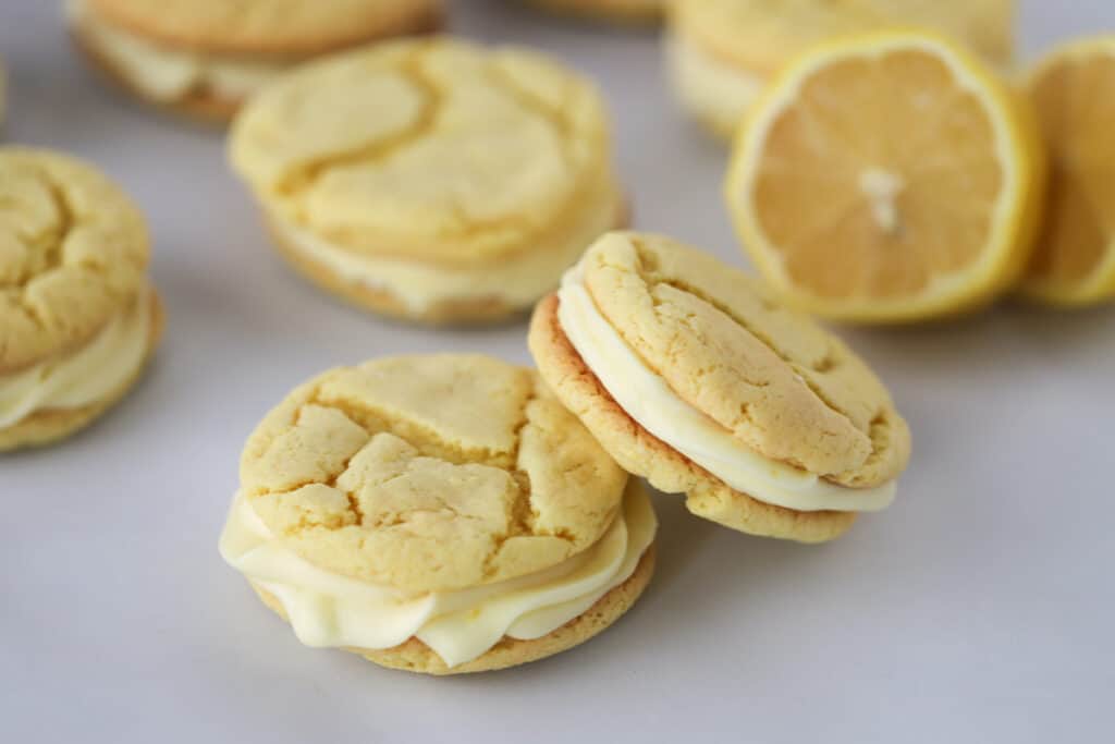 Lemon Oreos filled with lemon cream filling on a countertop; oreo sugar cookies, recipes with oreos, oreo dessert recipe.
