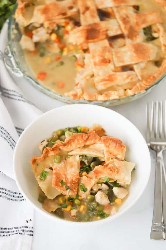 This chicken pot pie recipe from scratch is super easy. It is a double crust chicken pot pie, but we use store bought pie crust to keep things simple.