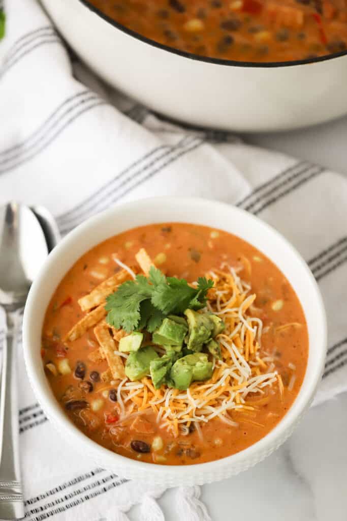 A bowl full of loaded chicken taco soup, chicken tortilla soup, chicken taco soup recipes.
