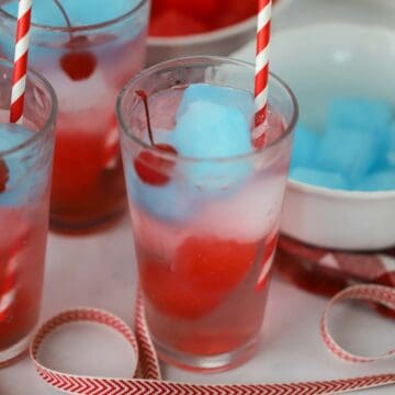 red white and blue punch in a glass