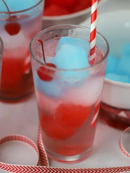 red white and blue punch in a glass