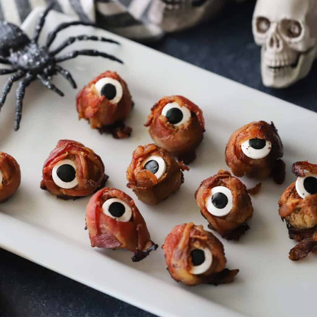 A serving plate with halloween cyclops meatballs