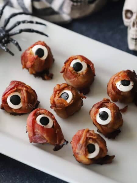 A serving plate with halloween cyclops meatballs
