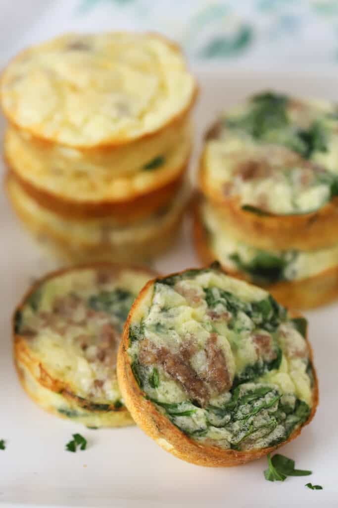 How to make high protein egg bites (cottage cheese filling), an easy breakfast filled with sausage, spinach, and cheese.