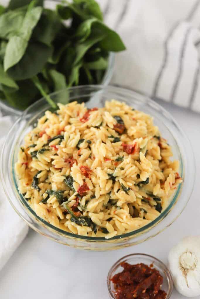 Orzo side dishes, creamy tuscan orzo with sundried tomatoes.