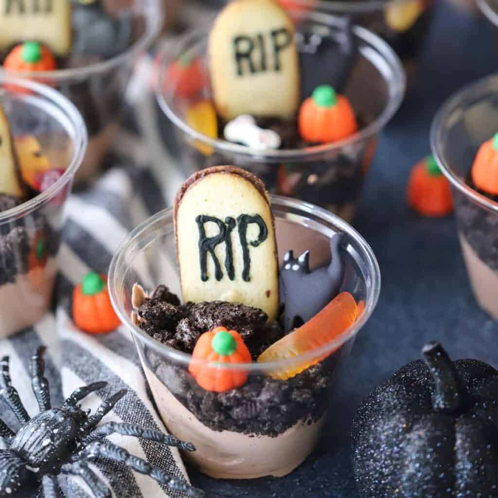 graveyard dirt cups decorated for a halloween party