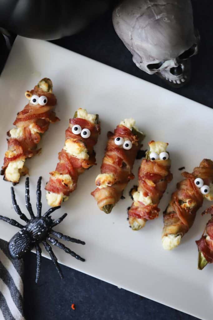 spooky jalapeno poppers, bacon wrapped jalapeno poppers halloween.